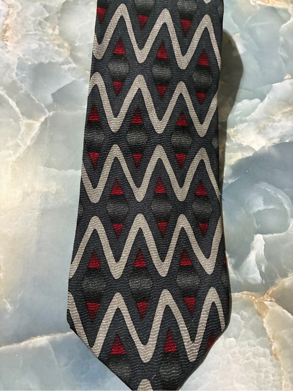 Men's Black Tie with Silver Chevron and Red Triangle Pattern